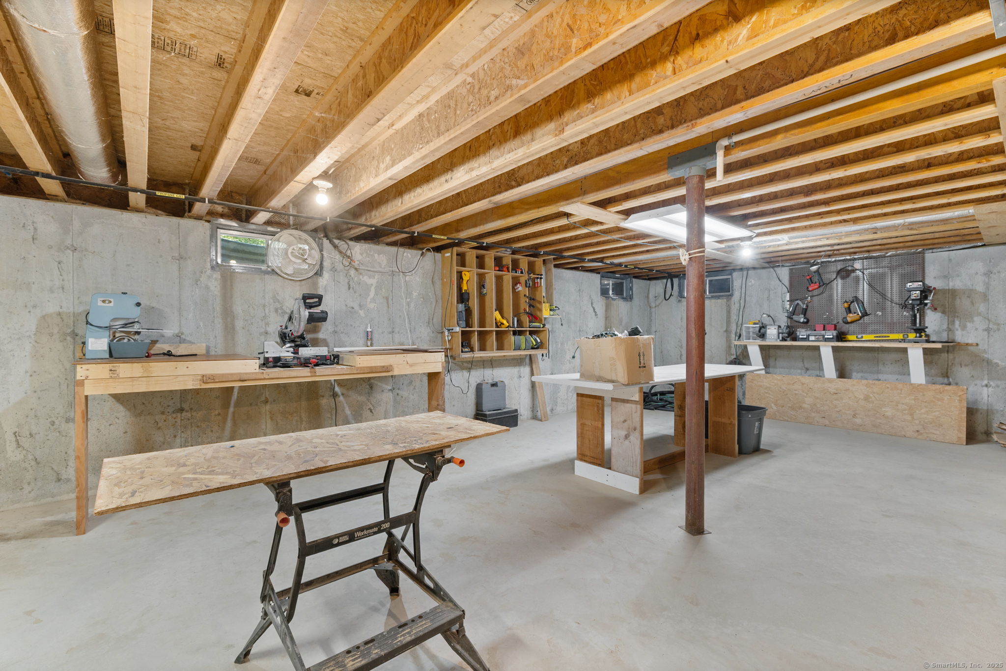 254 Haley Road Groton, CT 06355 - Photo 37 of 40 a dining room with furniture and a chandelier