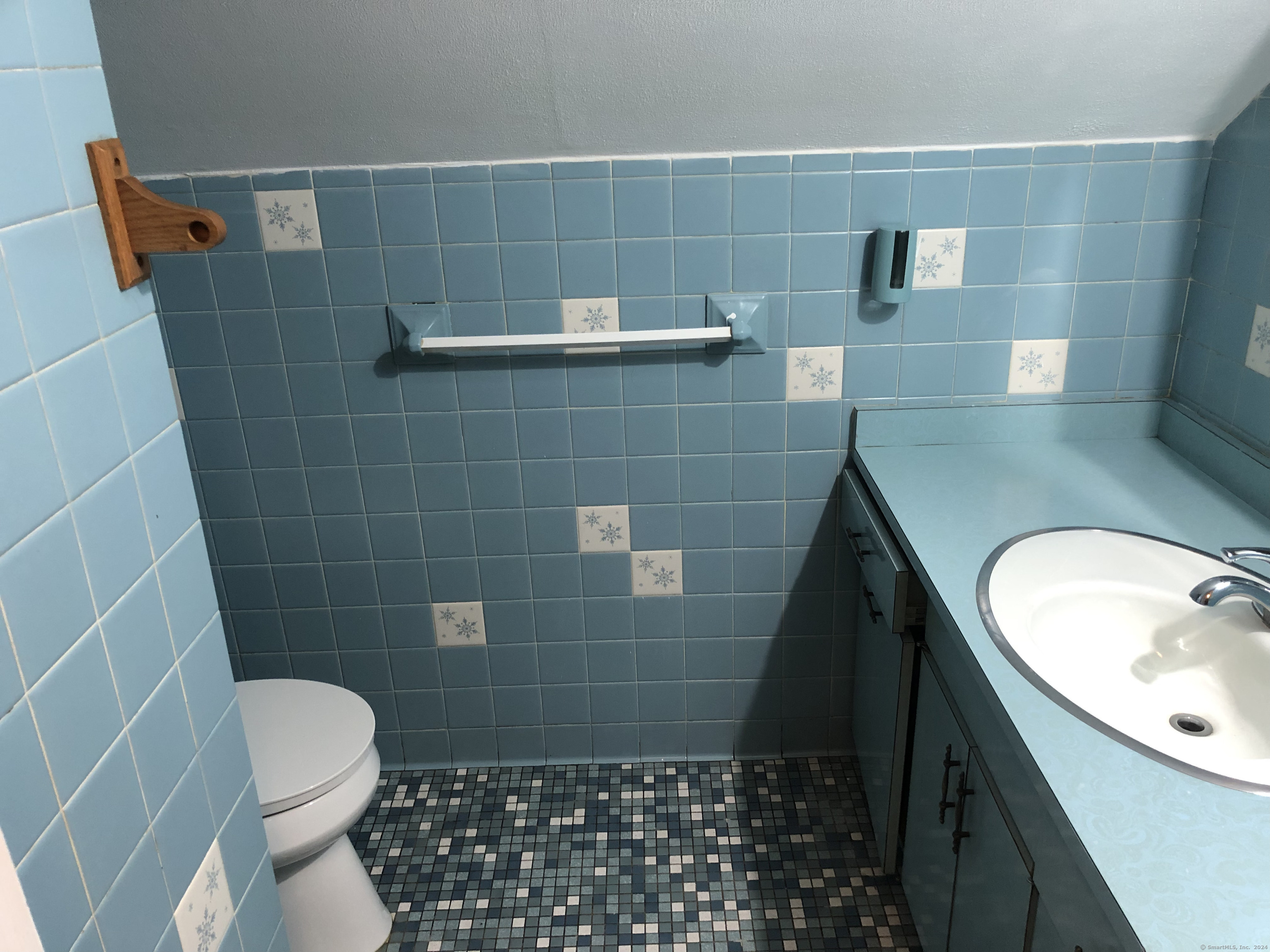 317 Garden Street Wethersfield, CT 06109 - Photo 13 of 14 a bathroom with a granite countertop sink toilet and shower