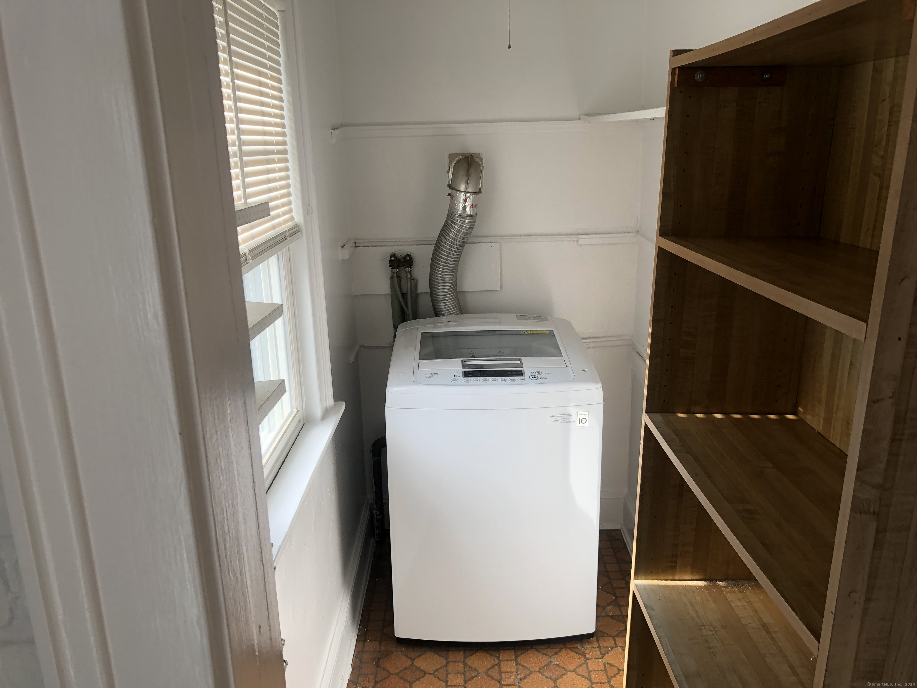 317 Garden Street Wethersfield, CT 06109 - Photo 6 of 14 a utility room with dryer and washer