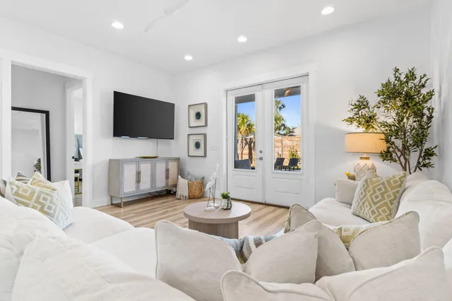 a bed room with a bed and lamps