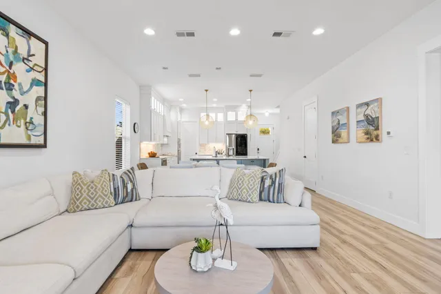 a bathroom with double vanity sinks and a mirror