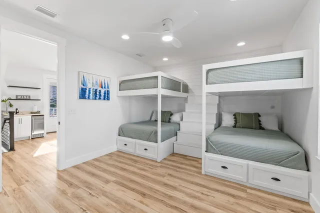 a view of a patio with table and chairs with wooden floor