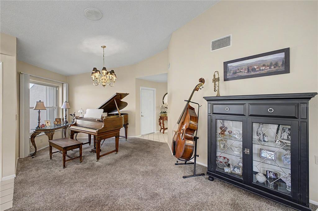 2662 Appleleaf Court Spring Hill, FL 34606 - Photo 7 of 47 a view of a room with furniture and a window