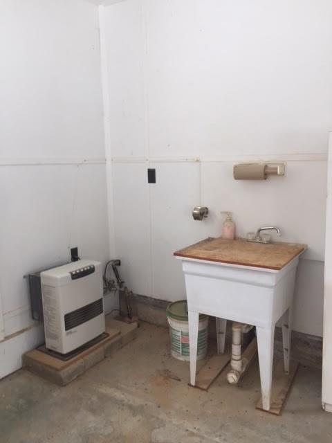 19 Soper Road Winthrop, ME 04364 - Photo 34 of 35 Workshop heater and sink