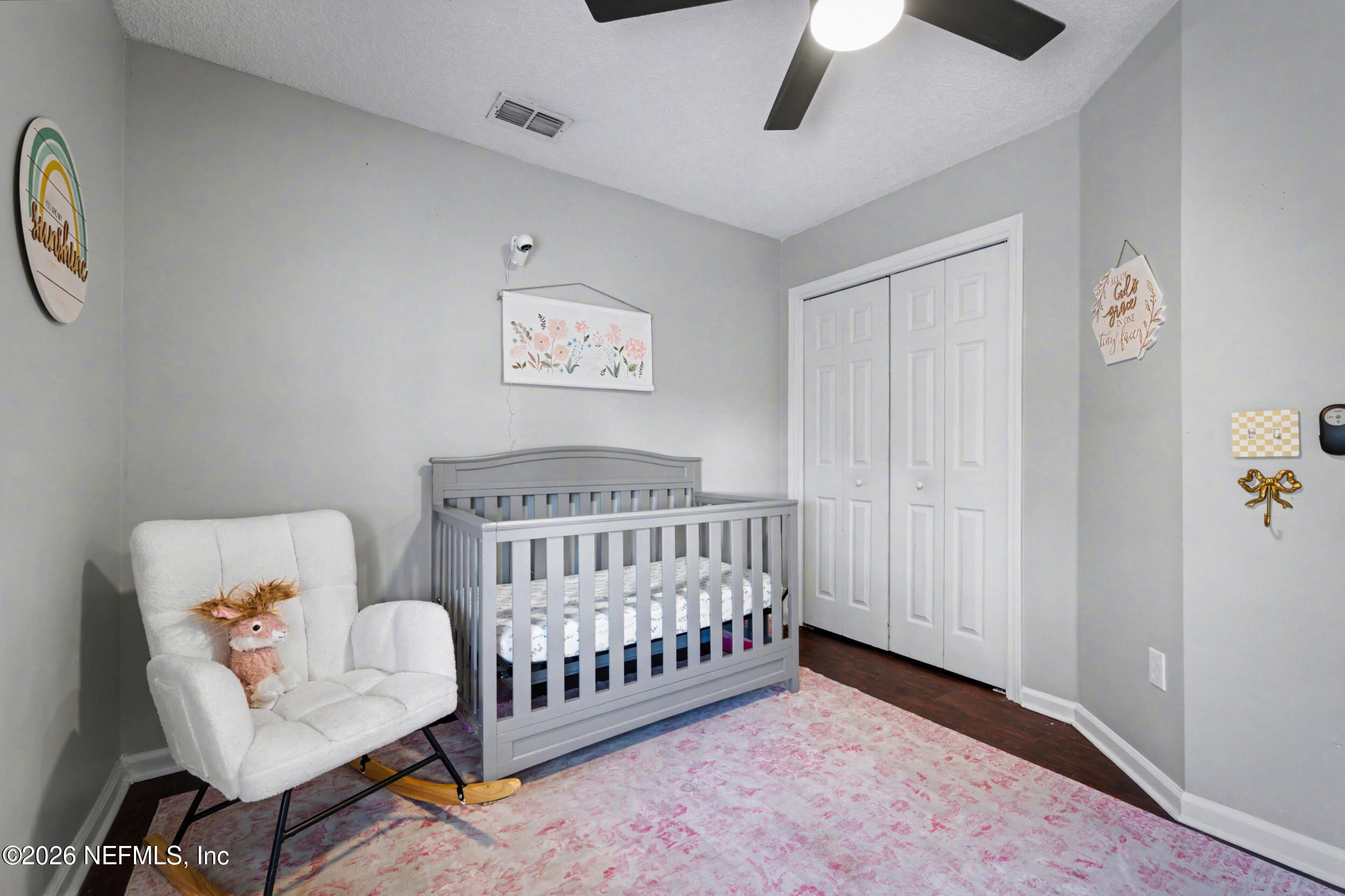 2992 Quapaw Trail Middleburg, FL 32068 - Photo 19 of 32 a bedroom with furniture and a window