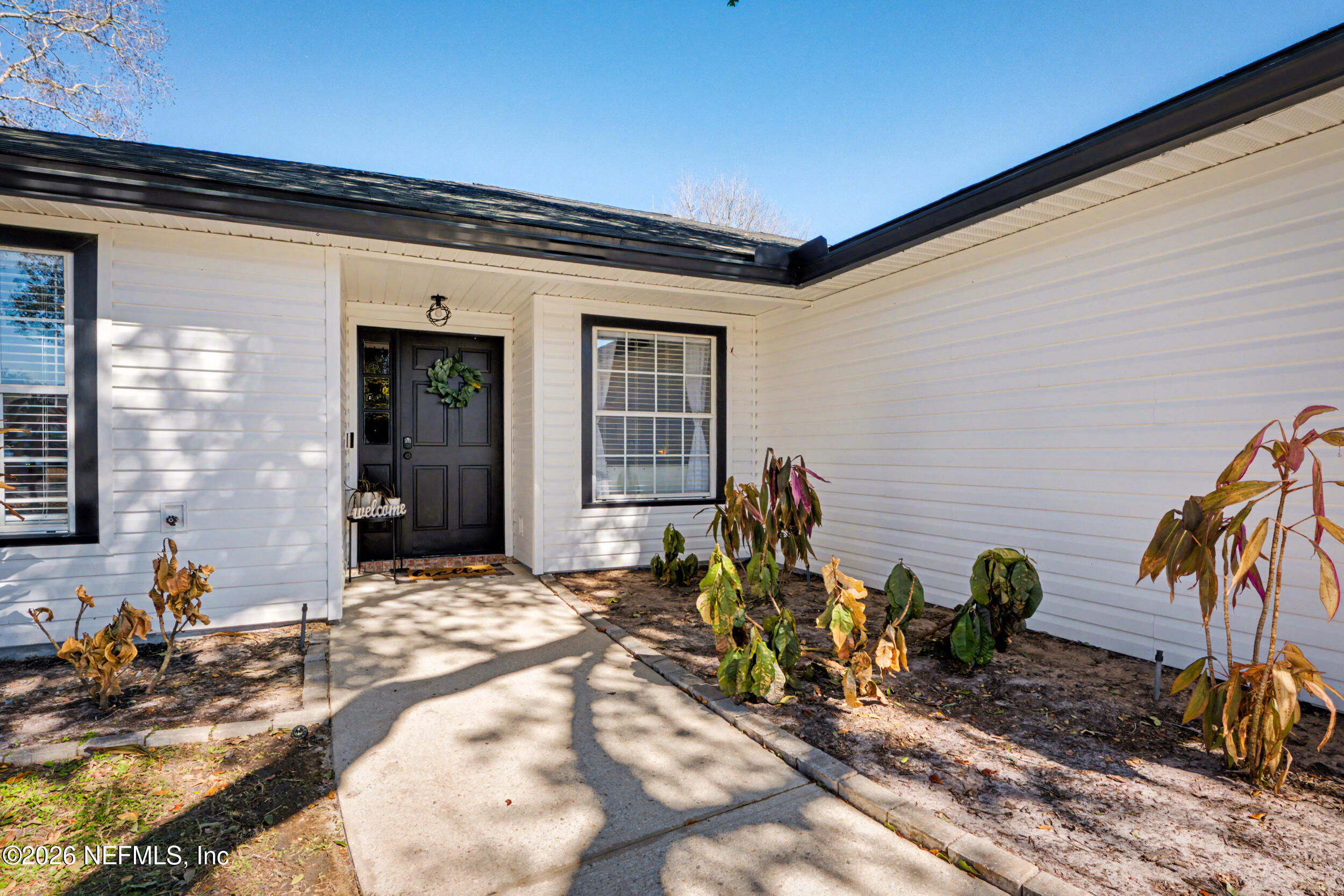 2992 Quapaw Trail Middleburg, FL 32068 - Photo 2 of 32 a view of a entryway door front of a house