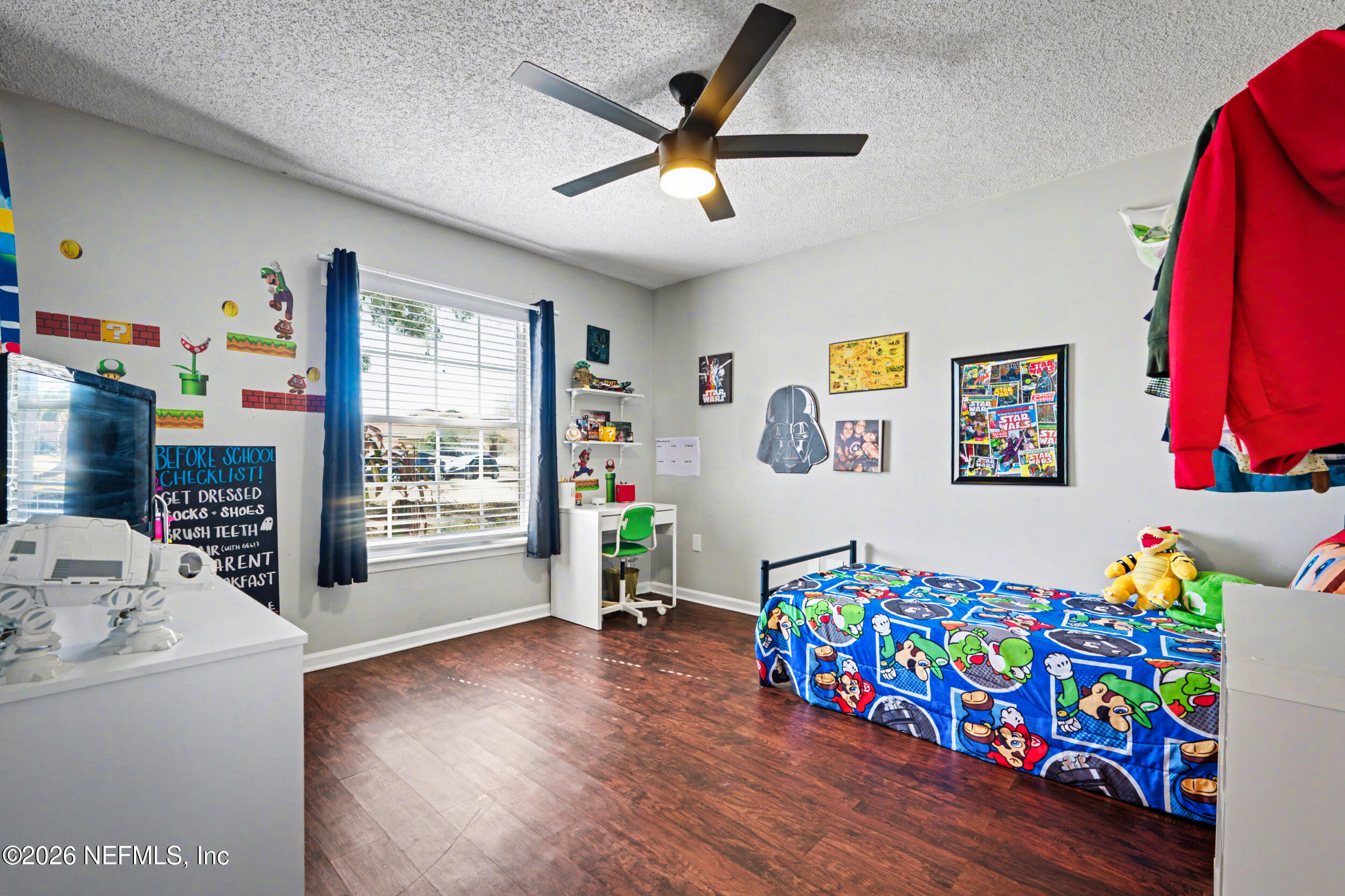 2992 Quapaw Trail Middleburg, FL 32068 - Photo 23 of 32 a living room with furniture and a window
