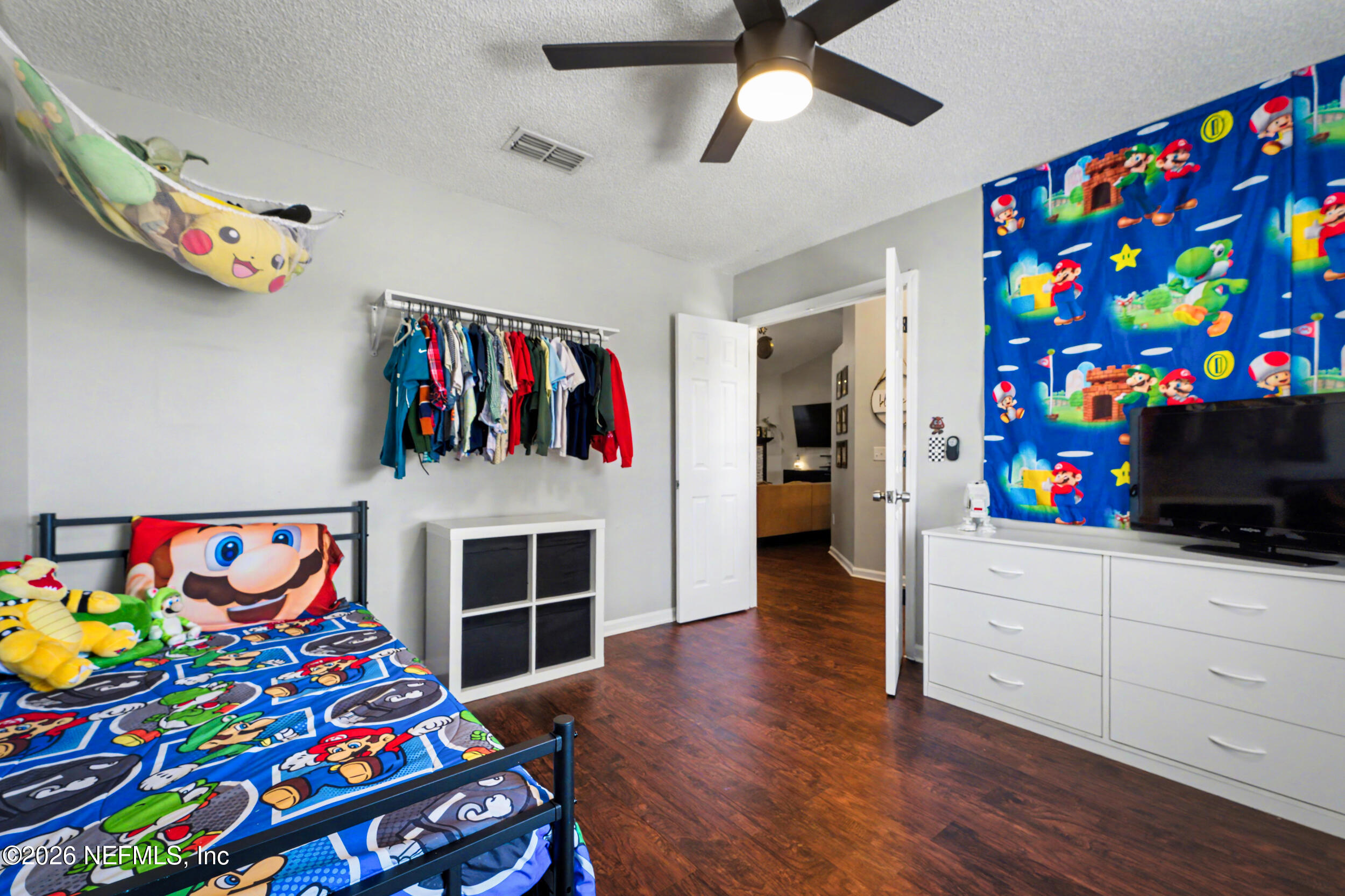 2992 Quapaw Trail Middleburg, FL 32068 - Photo 24 of 32 a living room with furniture and a wooden floor