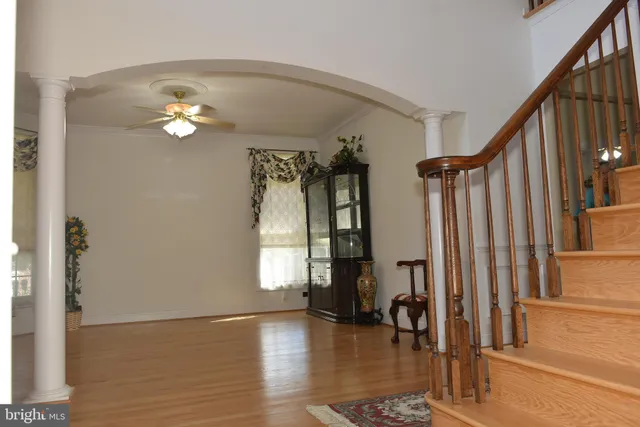 a view of entryway with wooden floor