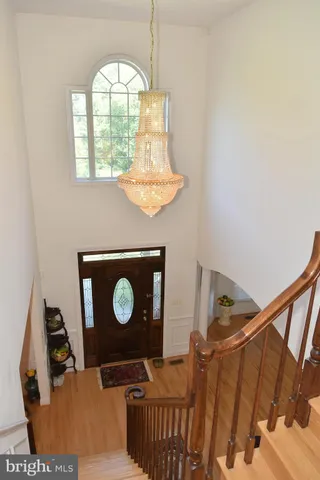 a bathroom with a sink a mirror and a shower