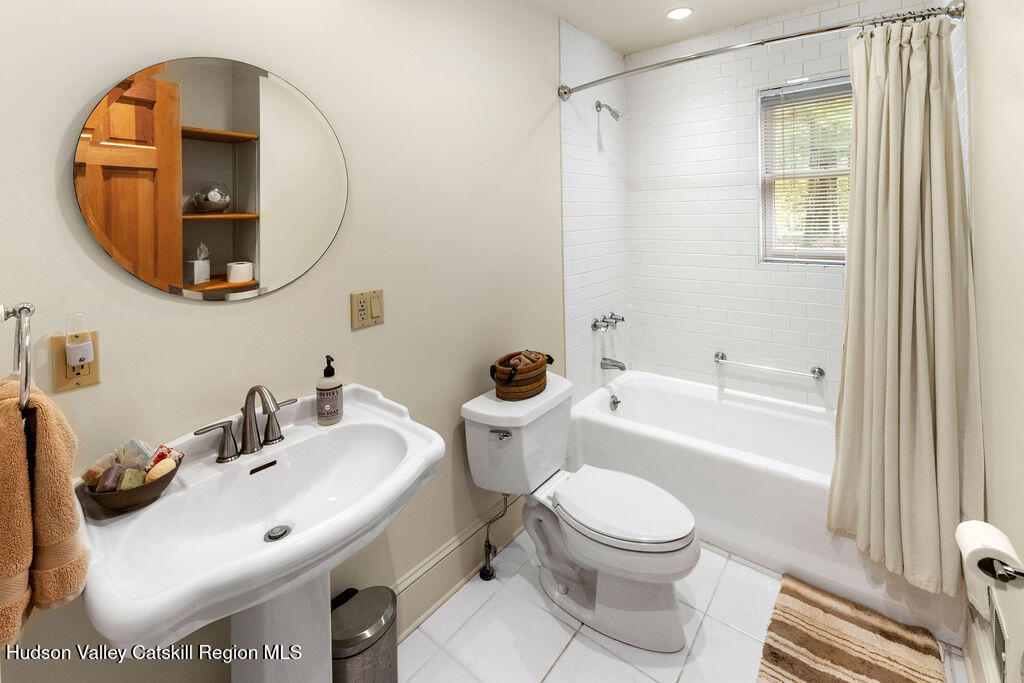 10 Old Farm Road Shokan, NY 12481 - Photo 11 of 68 a bathroom with a sink a toilet and a mirror