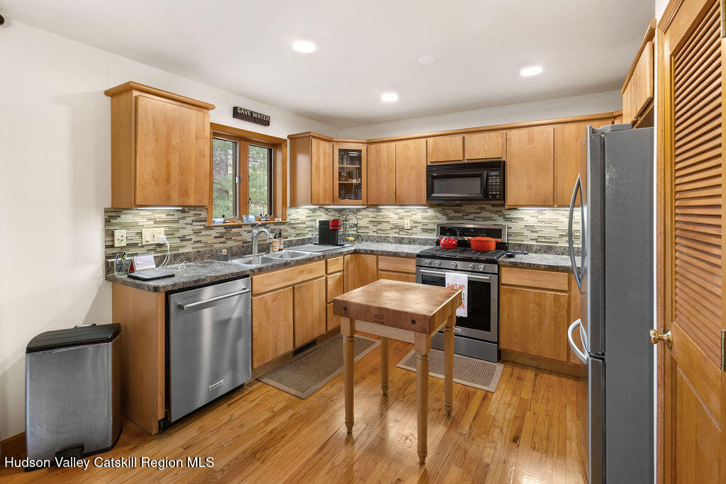10 Old Farm Road Shokan, NY 12481 - Photo 42 of 68 a kitchen with stainless steel appliances granite countertop a stove a sink and a microwave