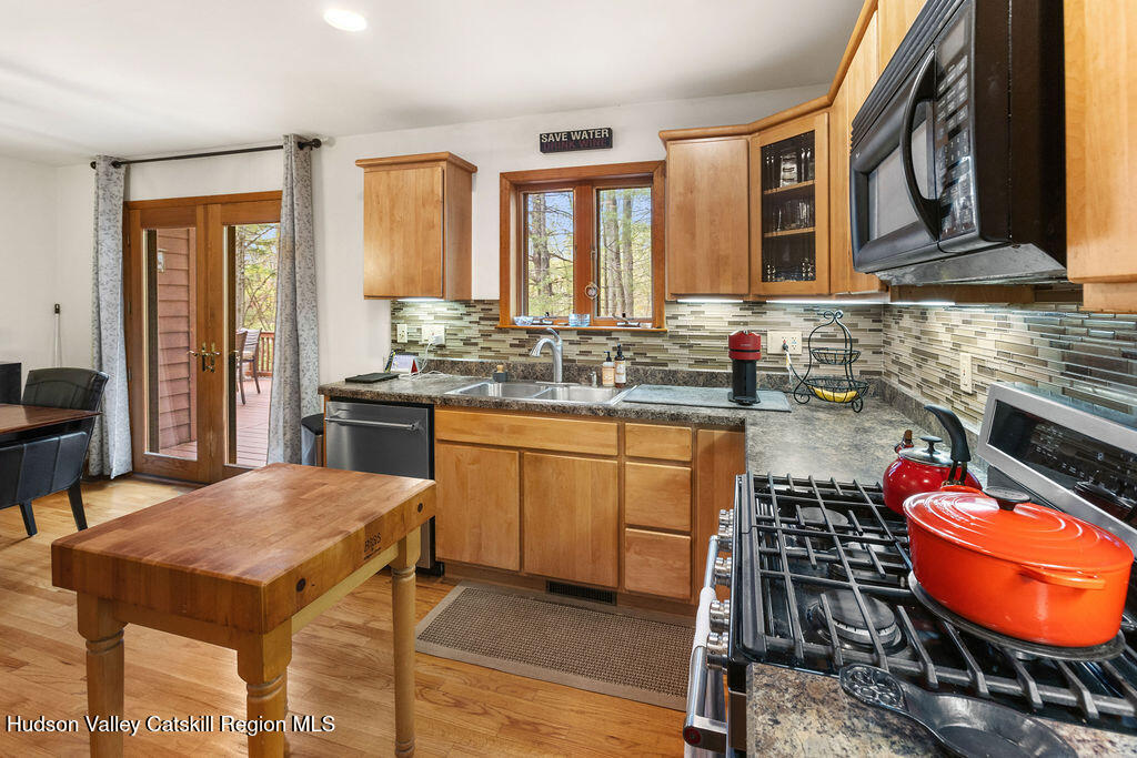 10 Old Farm Road Shokan, NY 12481 - Photo 45 of 68 a kitchen with a sink stove and cabinets
