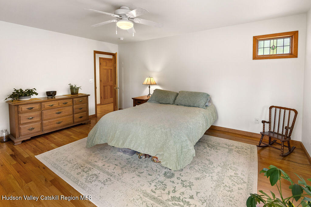 10 Old Farm Road Shokan, NY 12481 - Photo 47 of 68 a bedroom with a bed and dresser with mirror