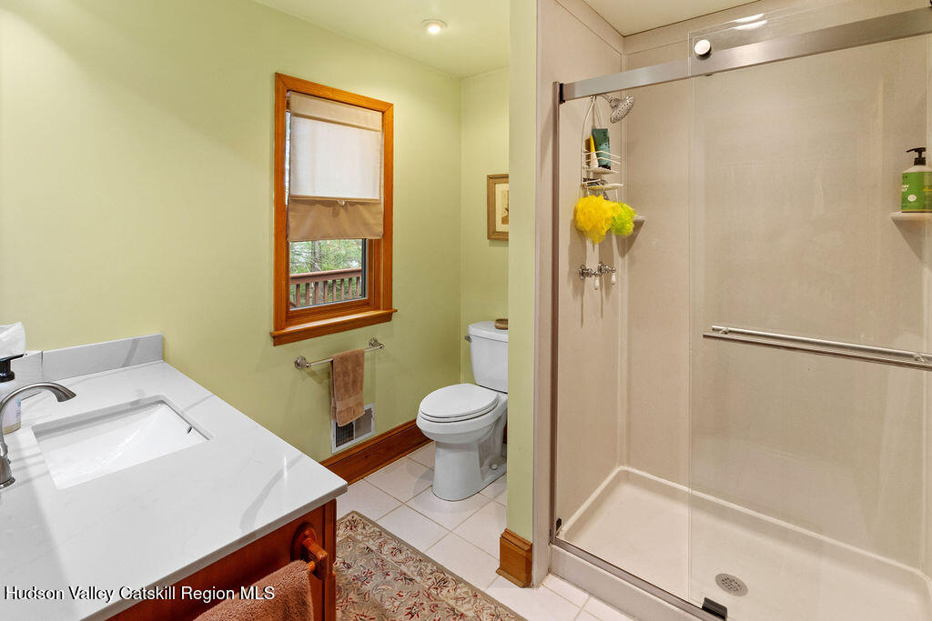 10 Old Farm Road Shokan, NY 12481 - Photo 48 of 68 a bathroom with a sink toilet and shower