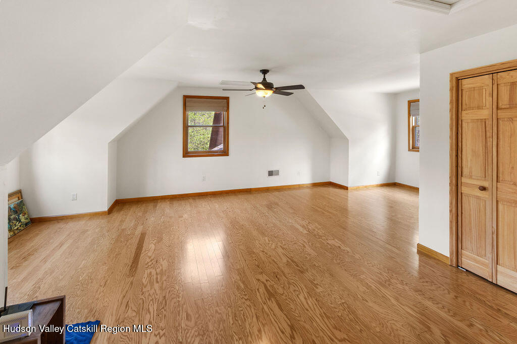 10 Old Farm Road Shokan, NY 12481 - Photo 50 of 68 wooden floor in an empty room with a window