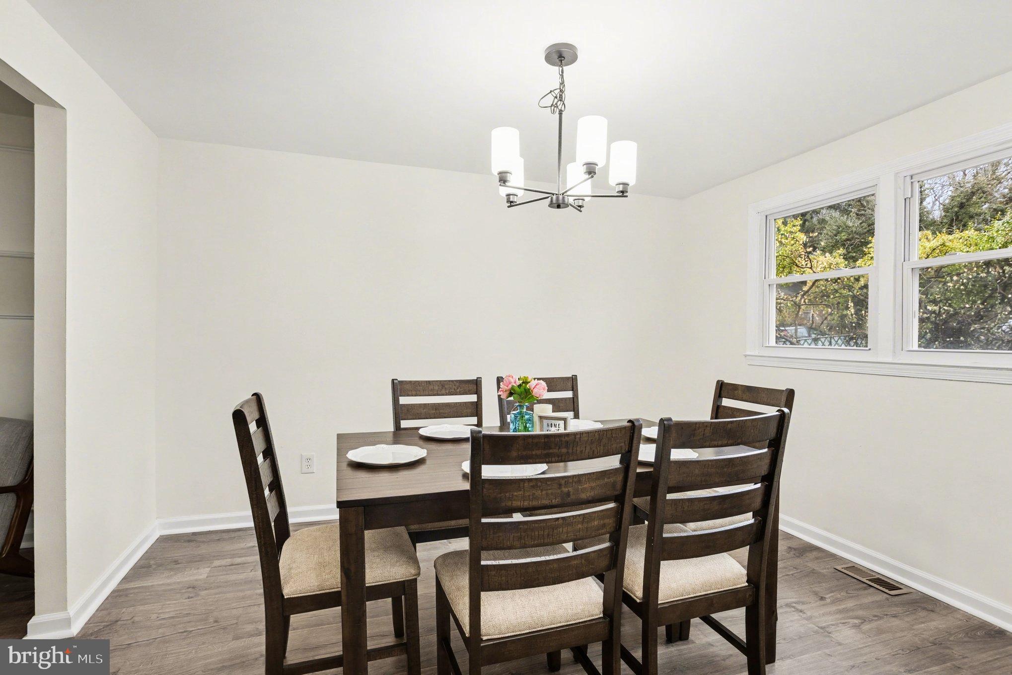 8029 Rider Avenue Towson, MD 21204 - Photo 16 of 41 a view of a dining room with furniture window and outside view