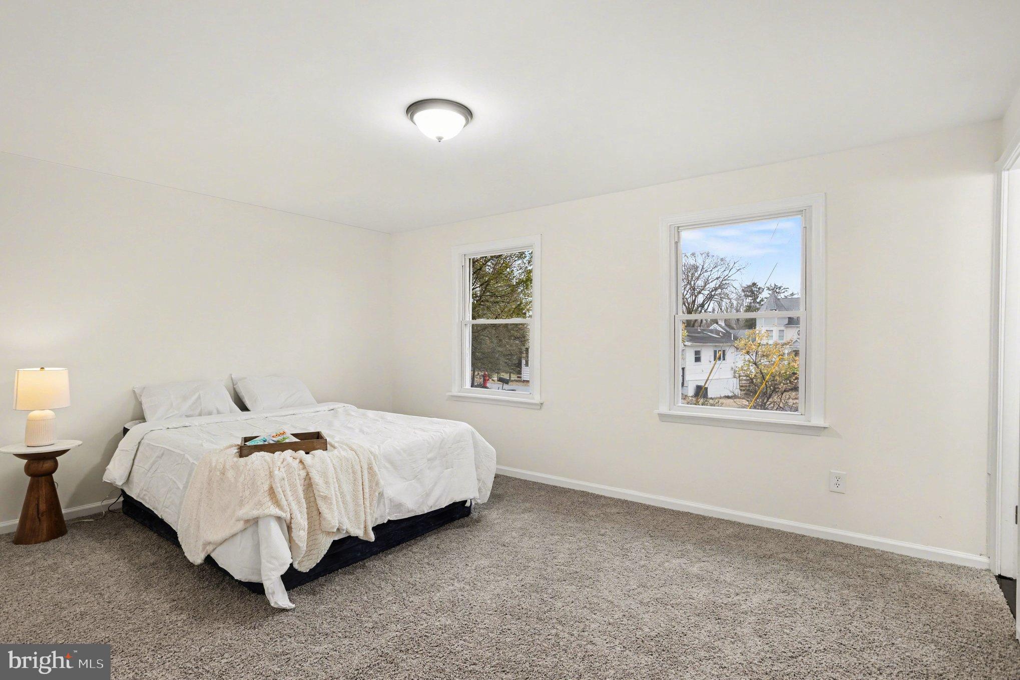 8029 Rider Avenue Towson, MD 21204 - Photo 20 of 41 a bed room with a bed and a window
