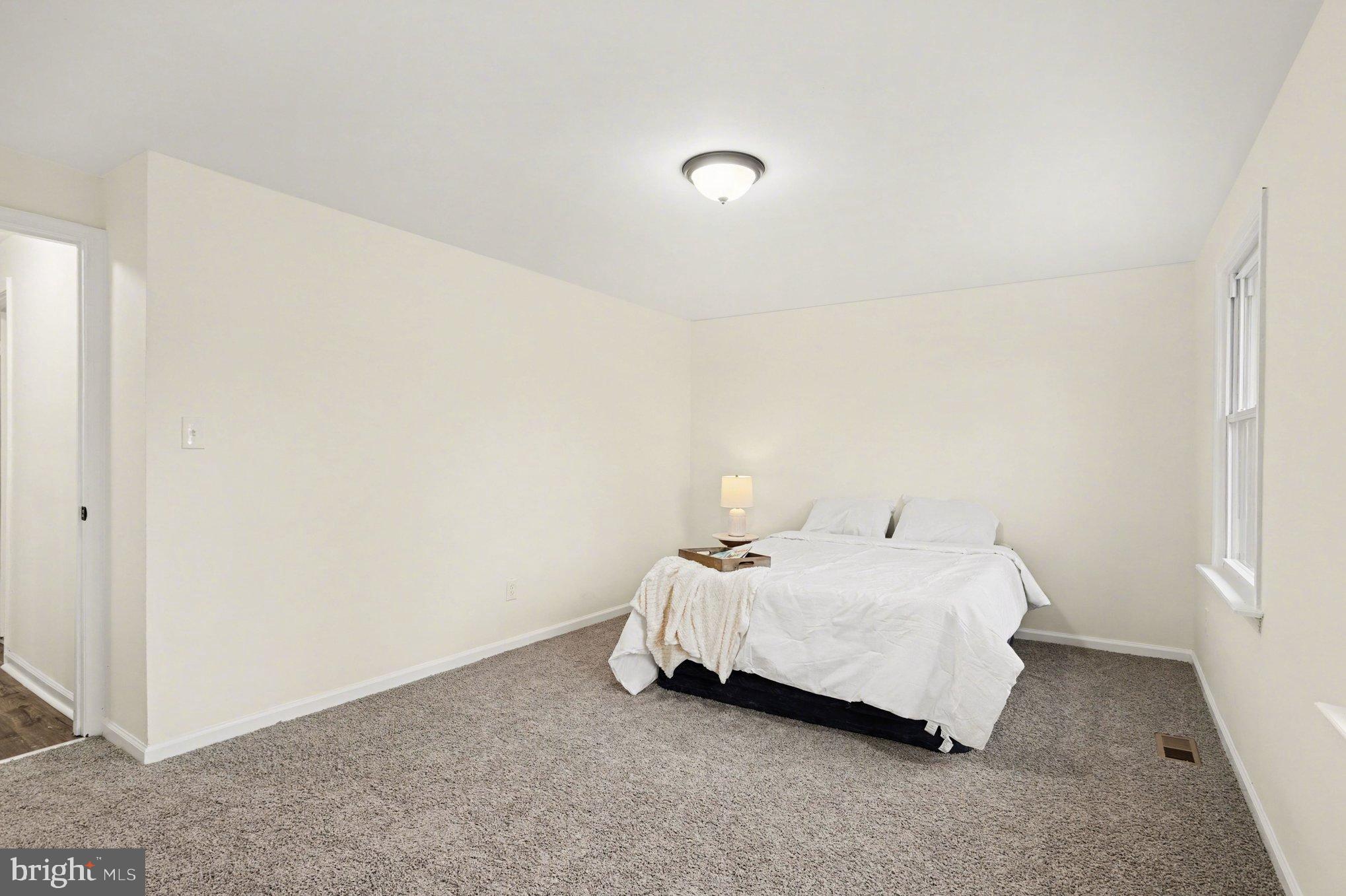 8029 Rider Avenue Towson, MD 21204 - Photo 21 of 41 a room with a bed and a window