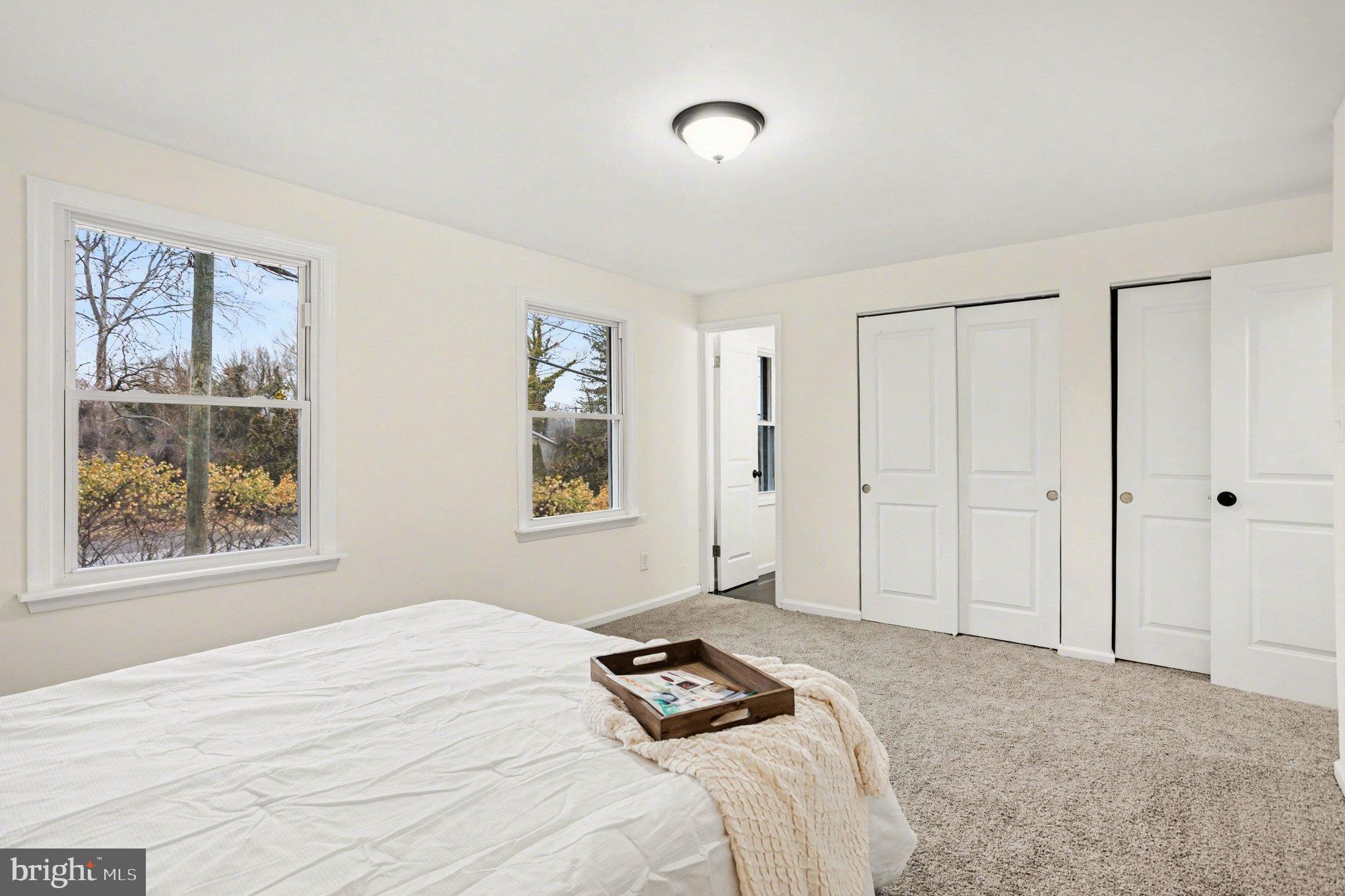 8029 Rider Avenue Towson, MD 21204 - Photo 22 of 41 a bedroom with a bed and a window