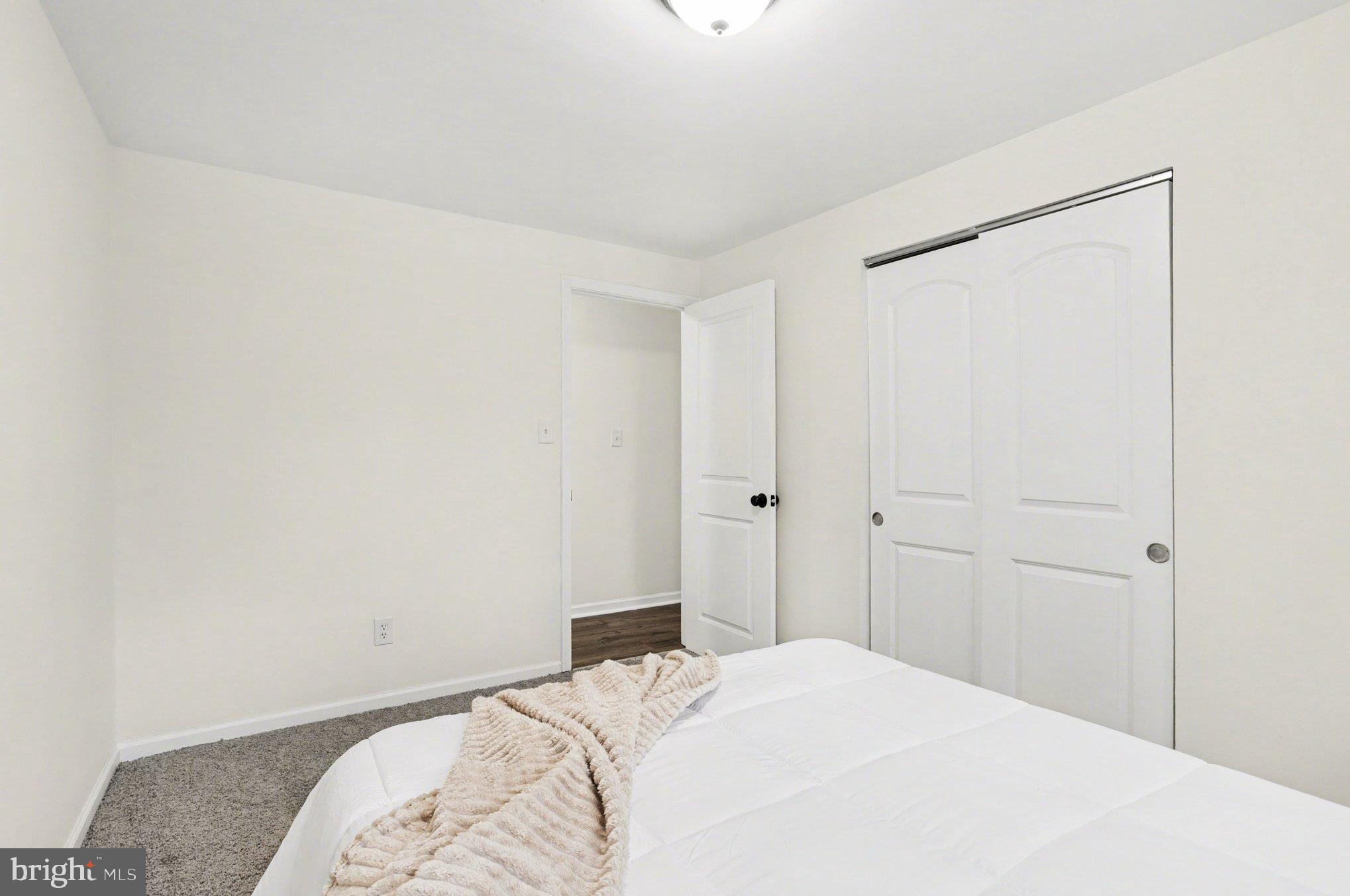 8029 Rider Avenue Towson, MD 21204 - Photo 24 of 41 a bedroom with a bed and a shower