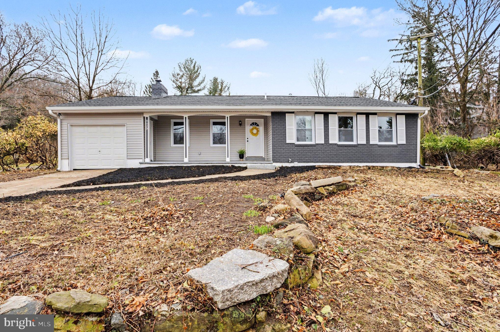 8029 Rider Avenue Towson, MD 21204 - Photo 3 of 41 a front view of a house with a yard