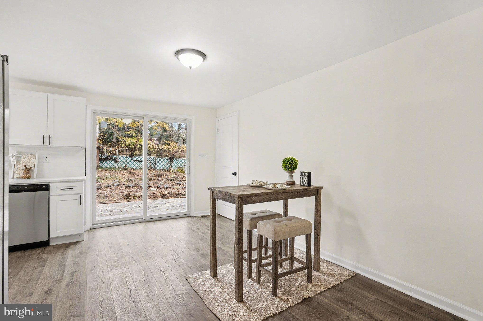 8029 Rider Avenue Towson, MD 21204 - Photo 10 of 41 a view of a workspace with furniture and wooden floor