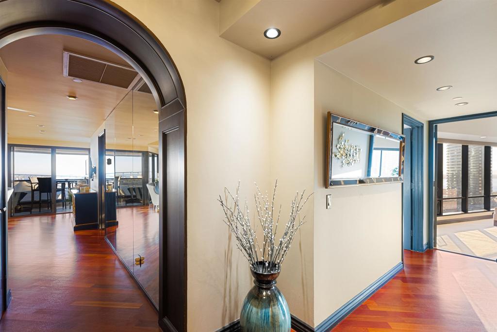 200 Harbor Drive, Unit 1502 San Diego, CA 92101 - Photo 11 of 48 a view of a hallway with wooden floor and a living room