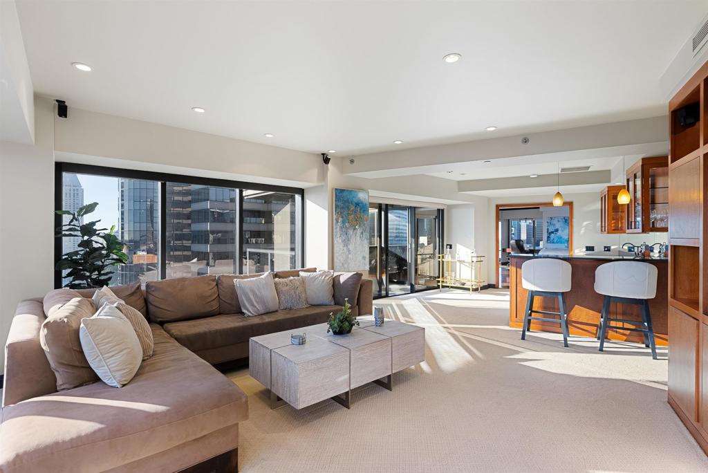 200 Harbor Drive, Unit 1502 San Diego, CA 92101 - Photo 12 of 48 a living room with furniture and a large window