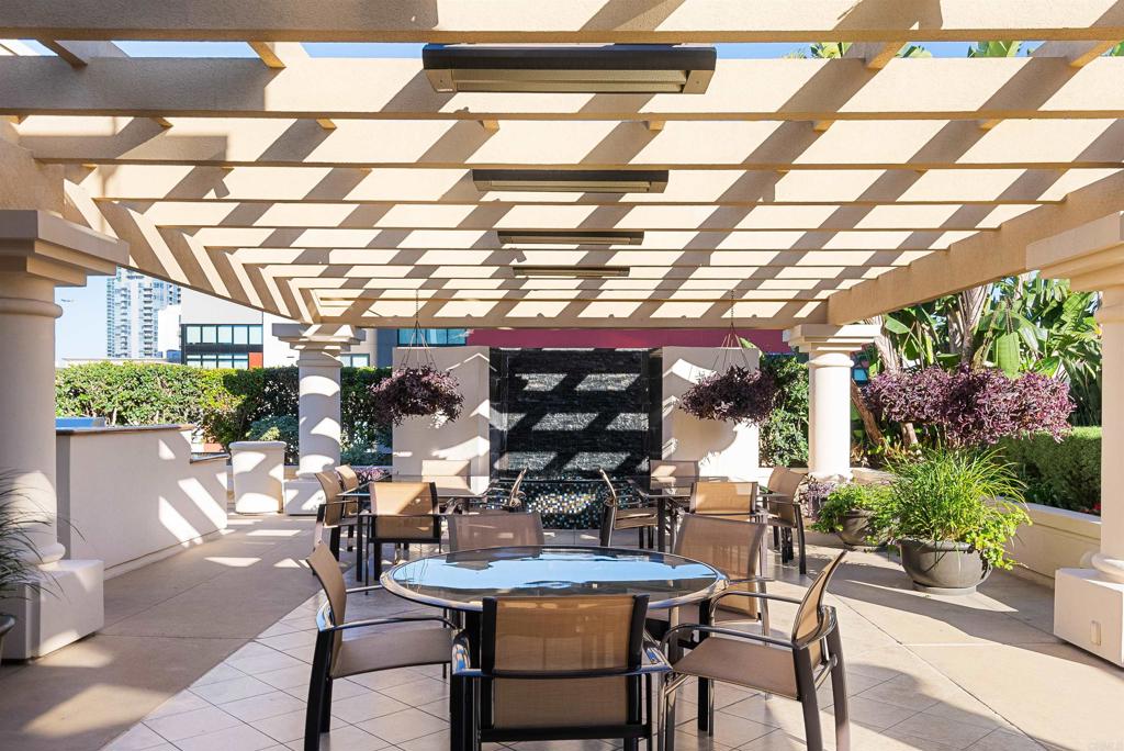 200 Harbor Drive, Unit 1502 San Diego, CA 92101 - Photo 33 of 48 a view of a table and chairs in a patio