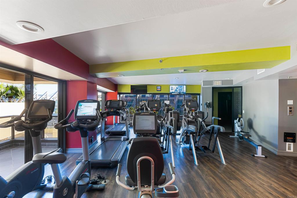 200 Harbor Drive, Unit 1502 San Diego, CA 92101 - Photo 38 of 48 a room with gym equipment and wooden floor
