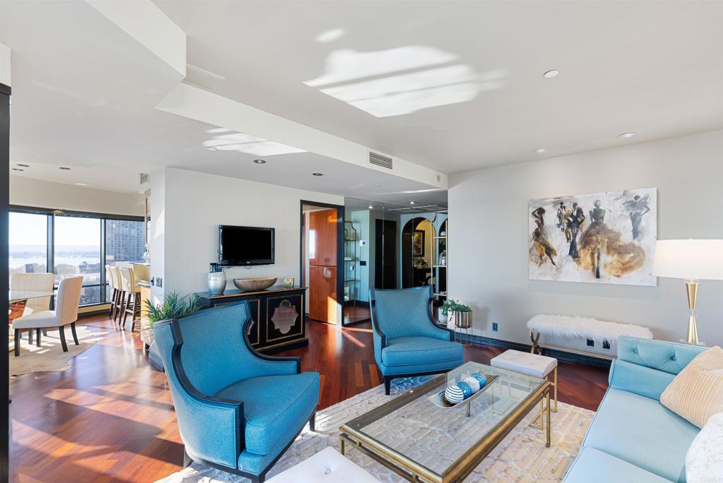 200 Harbor Drive, Unit 1502 San Diego, CA 92101 - Photo 4 of 48 a living room with furniture and a flat screen tv