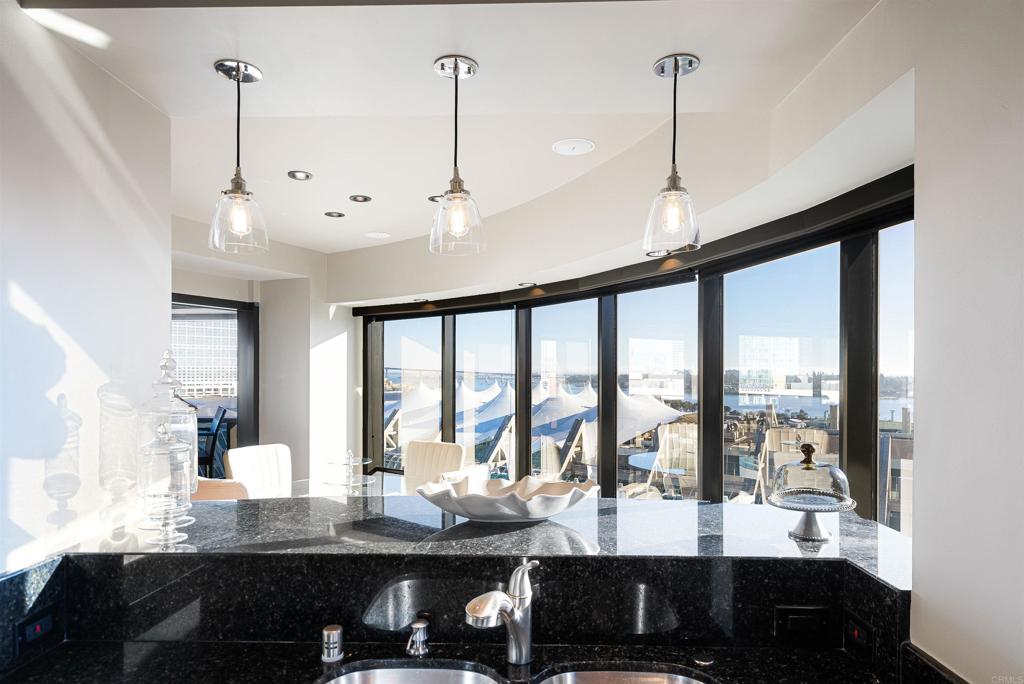 200 Harbor Drive, Unit 1502 San Diego, CA 92101 - Photo 6 of 48 a view of a living room and hardwood floor