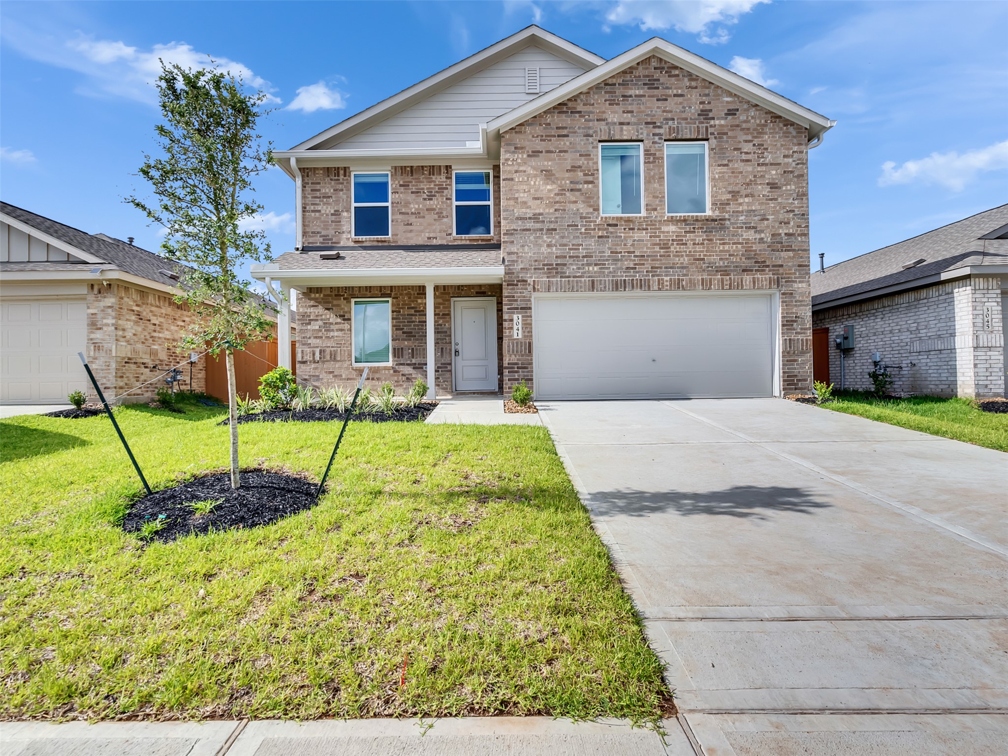 3041 Colusa Rdg Drive Katy, TX 77493 - Photo 1 of 26 a front view of a house with a garden