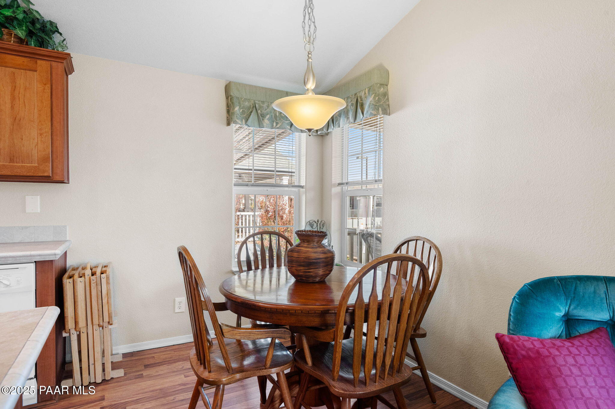 2214 Dove Drive Dewey, AZ 86327 - Photo 11 of 27 a view of a dining room with furniture and wooden floor
