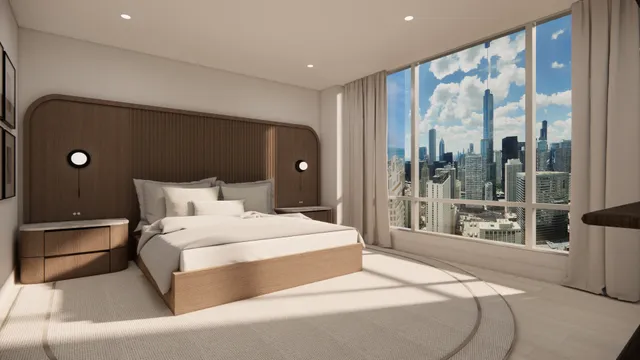 a bedroom with a large bed and a large window