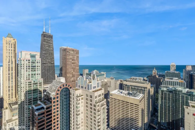 a view of city with tall buildings