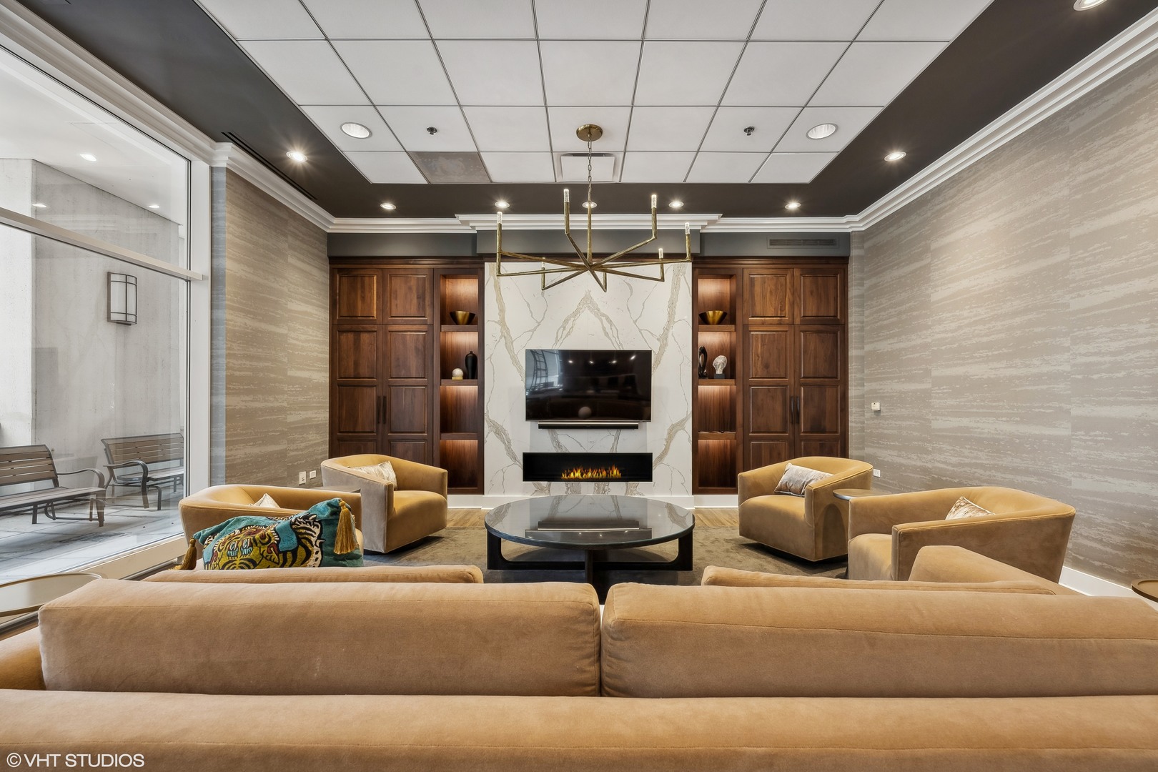 55 East Erie Street, Unit 5201 Chicago, IL 60611 - Photo 22 of 23 a living room with furniture and a flat screen tv