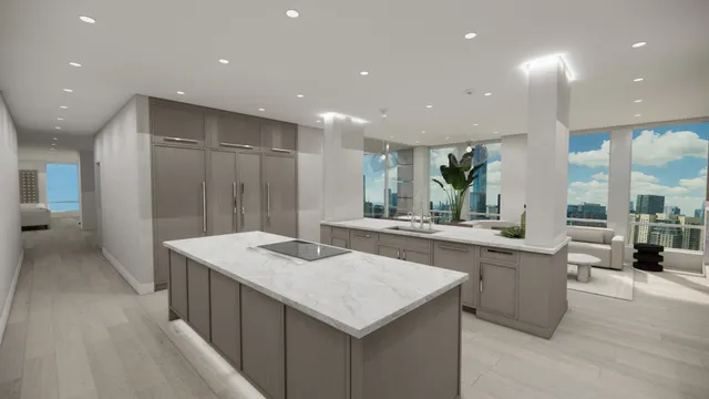 a kitchen with sink refrigerator and stove