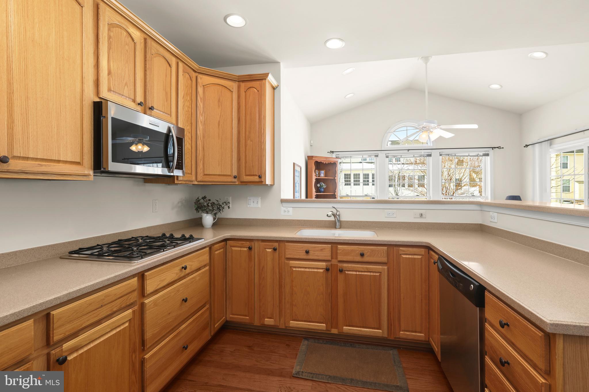 804 Bridle Path Bel Air, MD 21014 - Photo 19 of 53 a kitchen with stainless steel appliances granite countertop a sink stove and cabinets