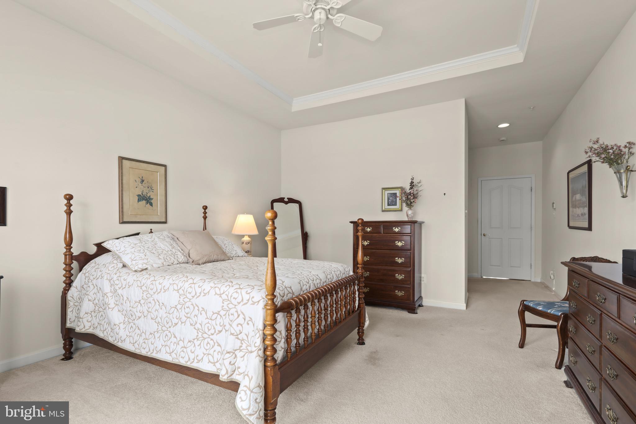 804 Bridle Path Bel Air, MD 21014 - Photo 27 of 53 a bedroom with a bed a dresser and chair
