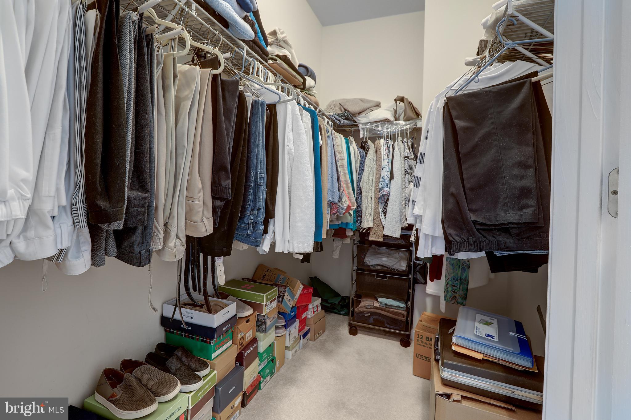 804 Bridle Path Bel Air, MD 21014 - Photo 28 of 53 a view of walk in closet with clothes and shoes