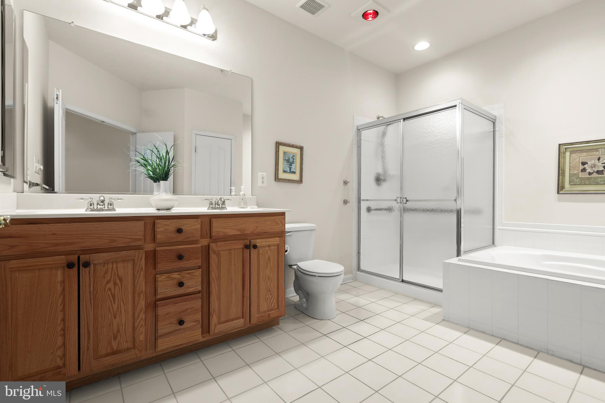 804 Bridle Path Bel Air, MD 21014 - Photo 29 of 53 a spacious bathroom with a granite countertop sink toilet and shower