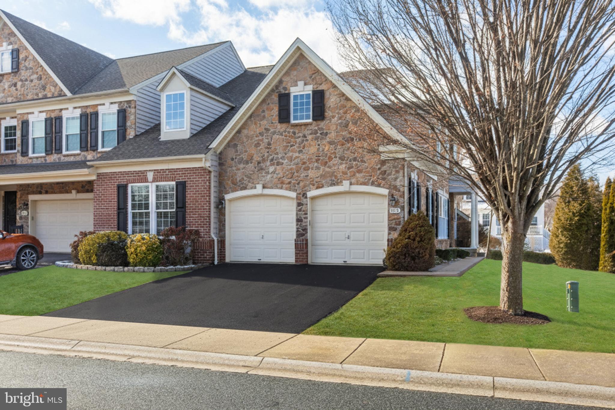 804 Bridle Path Bel Air, MD 21014 - Photo 3 of 53 a front view of a house with a yard and garage