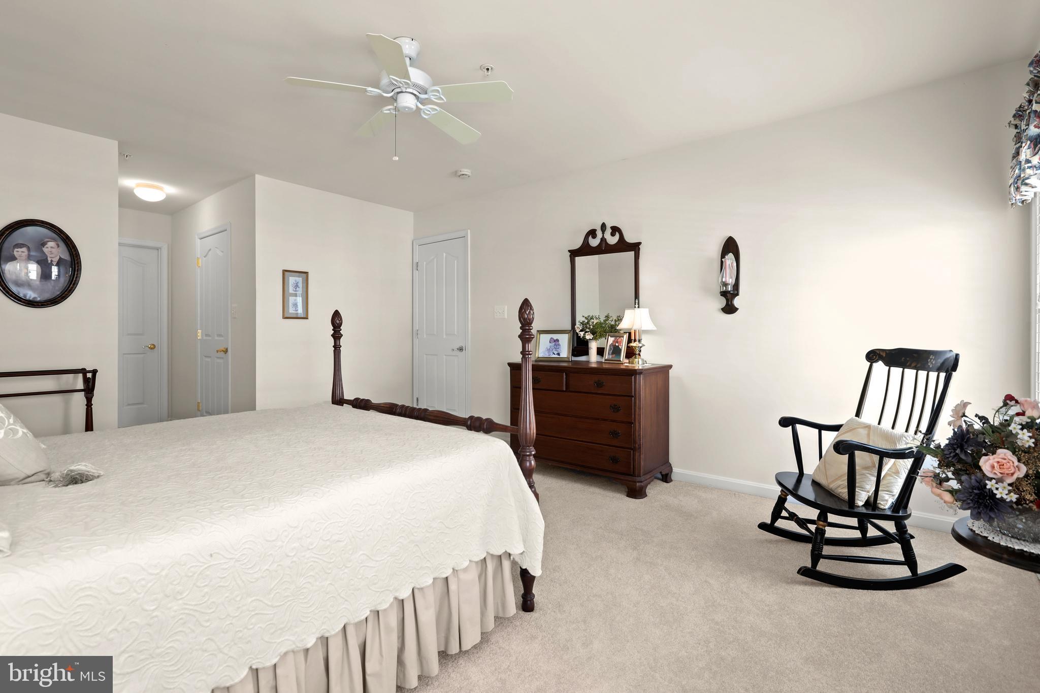 804 Bridle Path Bel Air, MD 21014 - Photo 36 of 53 a bedroom with a bed a dresser and chair