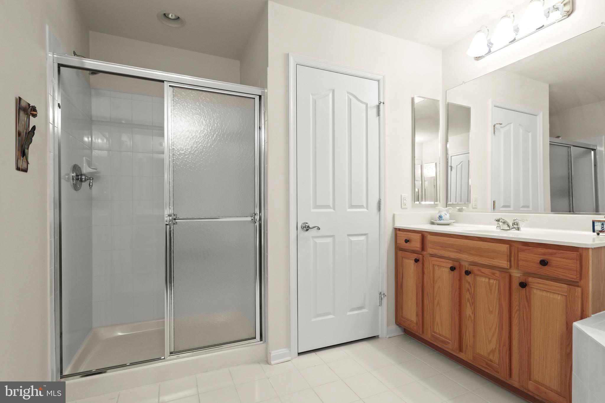 804 Bridle Path Bel Air, MD 21014 - Photo 38 of 53 a bathroom with a double vanity sink mirror and double