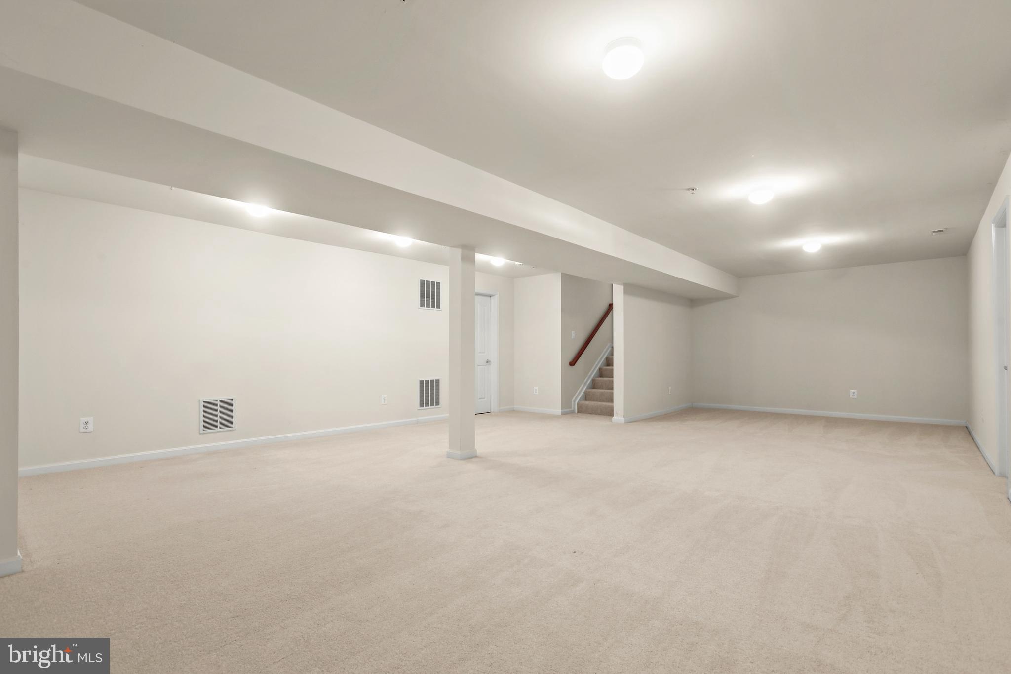 804 Bridle Path Bel Air, MD 21014 - Photo 44 of 53 an empty room with a projector and a window