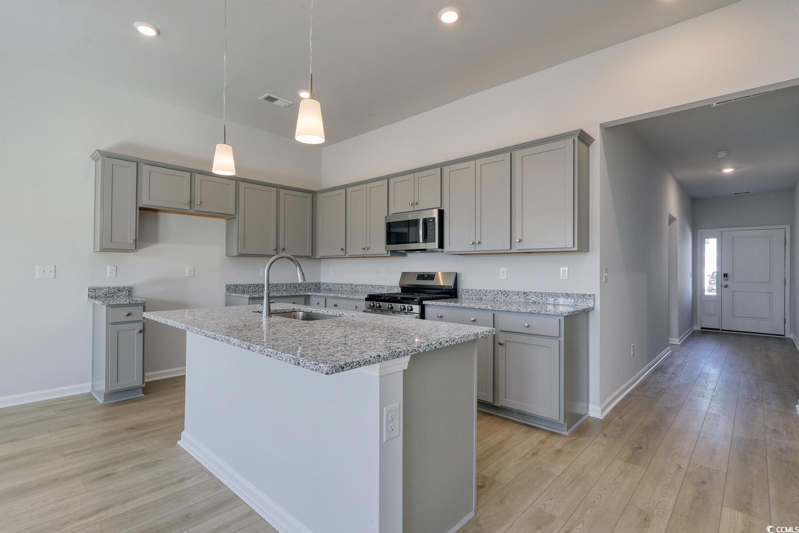 235 Sundrop Way Conway, SC 29526 - Photo 2 of 24 Kitchen featuring gray cabinets, appliances with stainless steel finishes, pendant lighting, and recessed lighting
