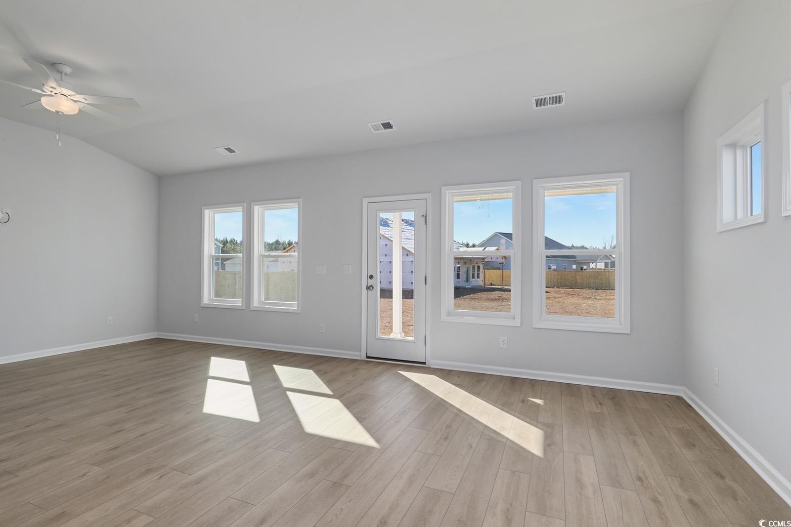 235 Sundrop Way Conway, SC 29526 - Photo 8 of 24 Spare room with light wood-type flooring and a ceiling fan