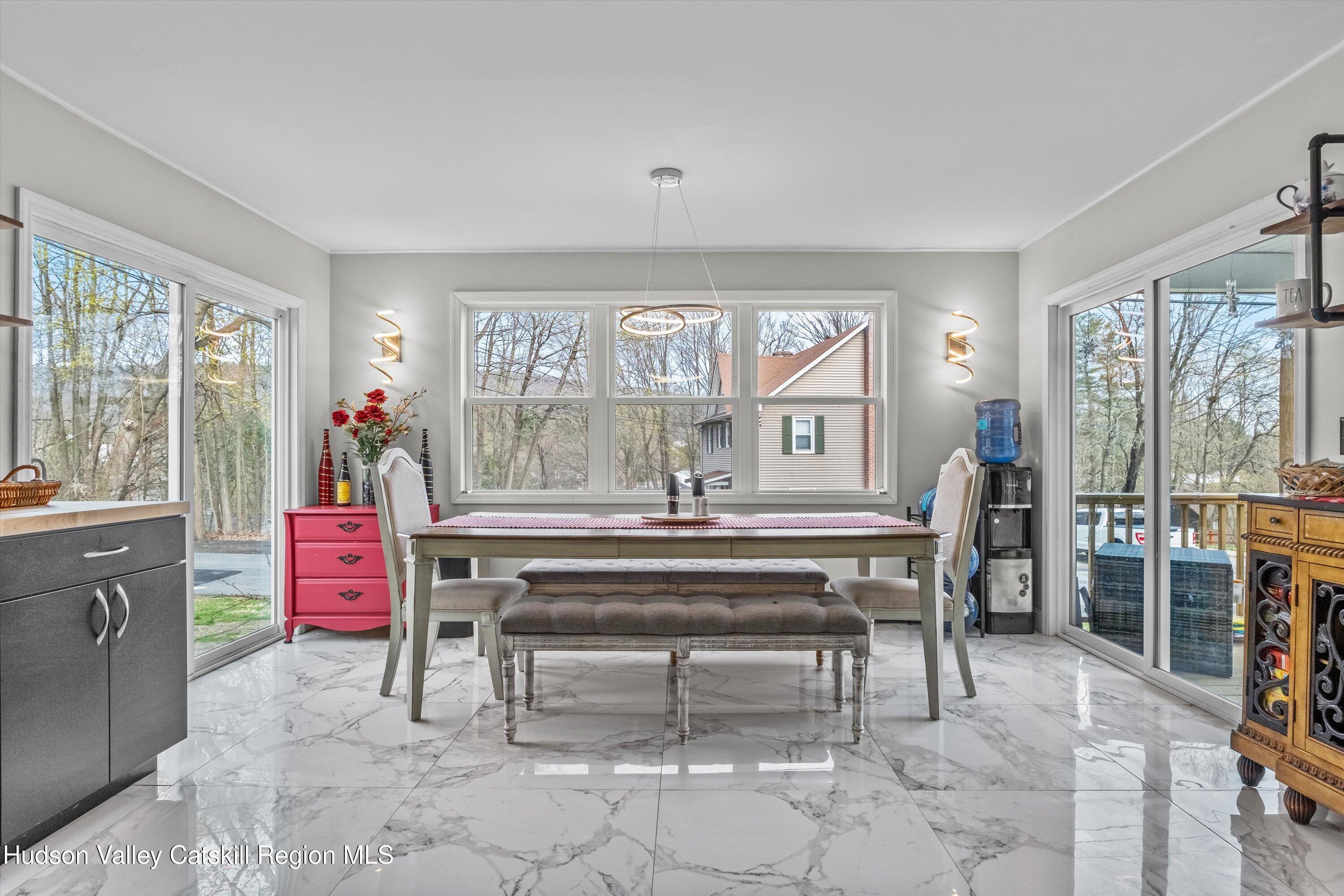 6 Smith Terrace Lloyd, NY 12528 - Photo 11 of 33 a living room with furniture a rug and a window